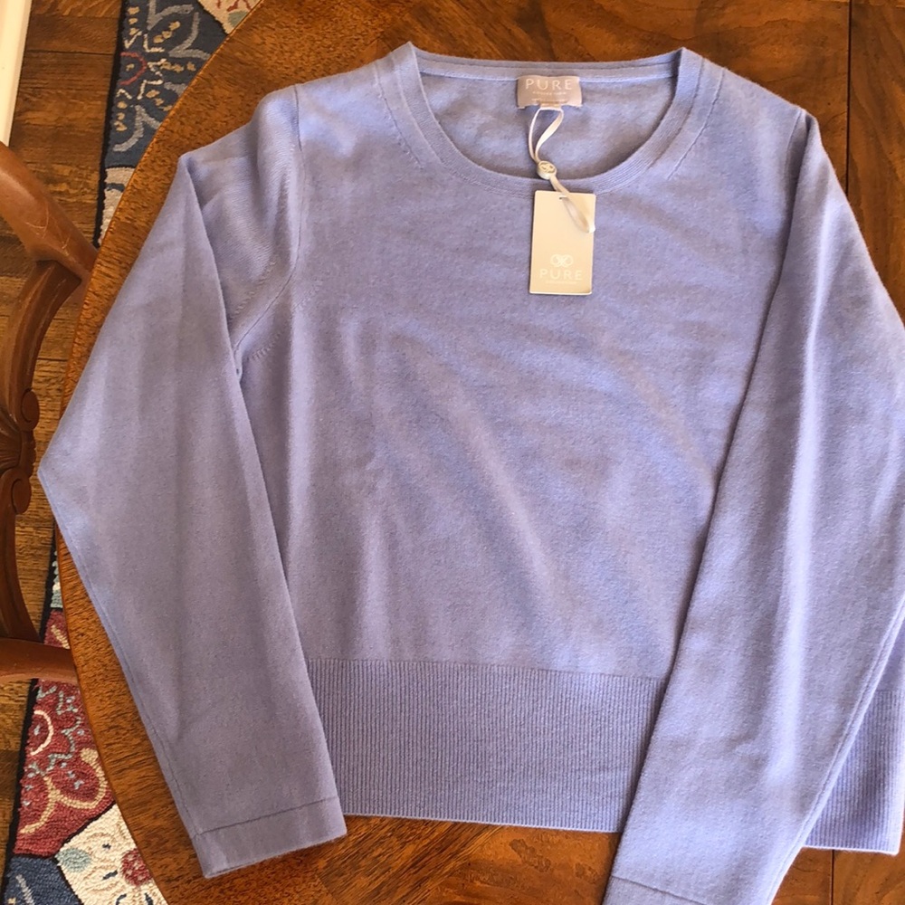 Light blue scoop neck cashmere sweater. Size 14/16. “Cropped” length.